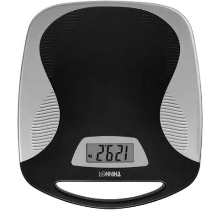 Conair Thinner Portable Digital Scale in Black/Silver Weight Capacity 350 lb /160 kg Large 1.3" high contrast digital display Platform size: 11.5" x 13" Includes long-life lithium battery Easy to read and to store "tap on" feature for instant activation