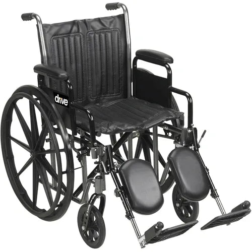 Wheelchair Econ Rem Desk Arms 20" w/ELR Dual Axle K1/K2 20" DETACHABLE ARM Swing-away Elevating Leg-rests Powder coated silver-vein steel frame Padded armrests Embossed vinyl upholstery lightweight Urethane tires push to lock brakes 8"